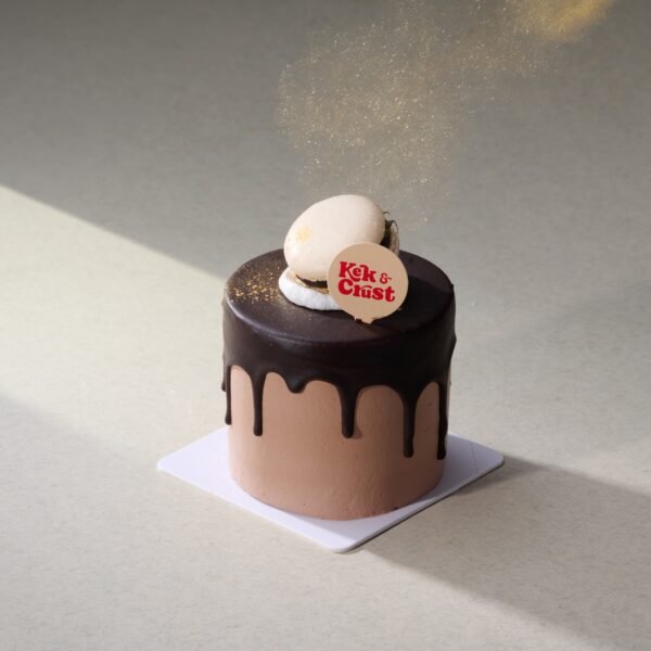 Chocolate Hazelnut Petite Cake topped with macaron and chocolate ganache by Kek & Crust, 3-inch mini cake dessert