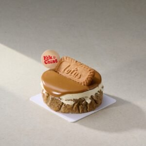 Earl Grey Lemon Burnt Cheesecake topped with biscoff glaze and cookie by Kek & Crust