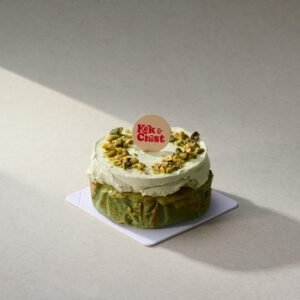 Pistachio Burnt Cheesecake 4 Inches by Kek & Crust on a light background