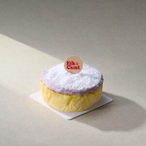 am mochi burnt cheesecake with coconut topping on a white base