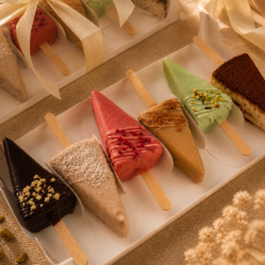 Signature 6-Piece Cheesecake Cakesicles Gift Box by Kek & Crust featuring handcrafted premium cheesecake collection.