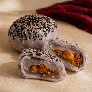 Yam 3Q mooncake cross-section with yam paste, mochi and salted egg chicken floss